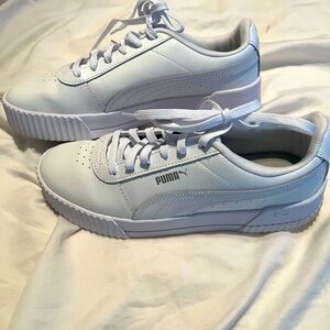 Puma Carina size 10